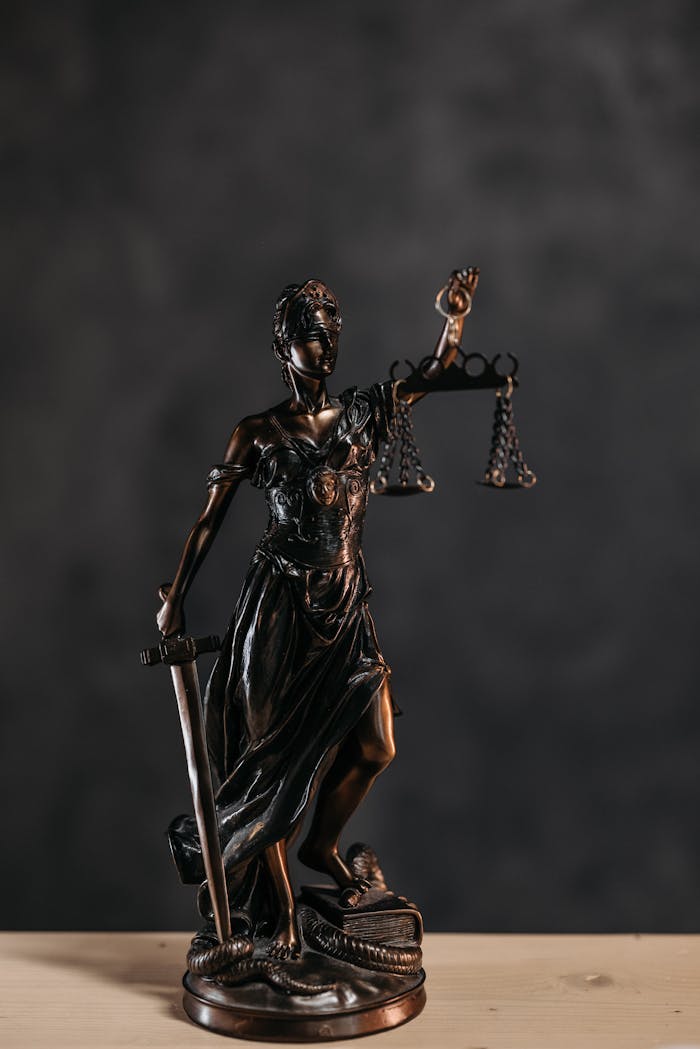 menu-15 Elegant bronze Lady Justice statuette symbolizing law and justice.